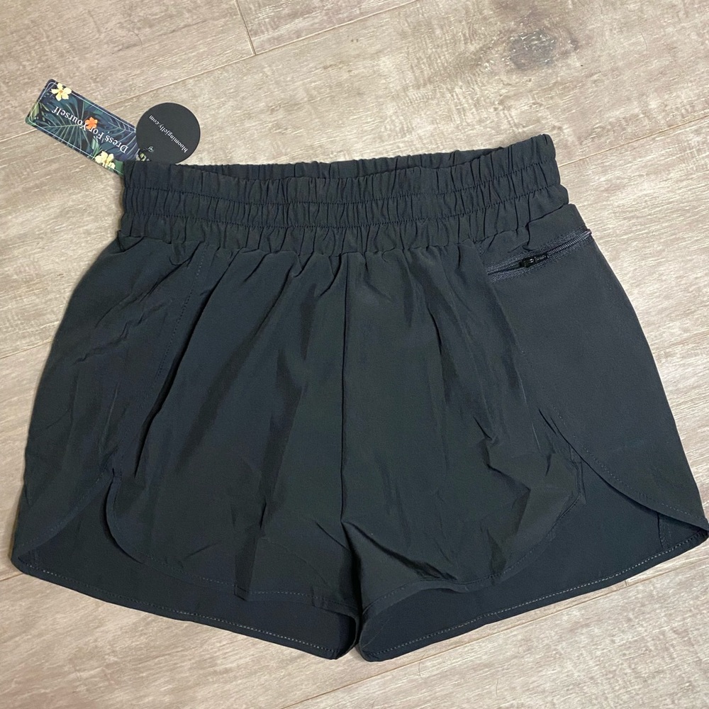 Black quick-dry running shorts. Never worn
